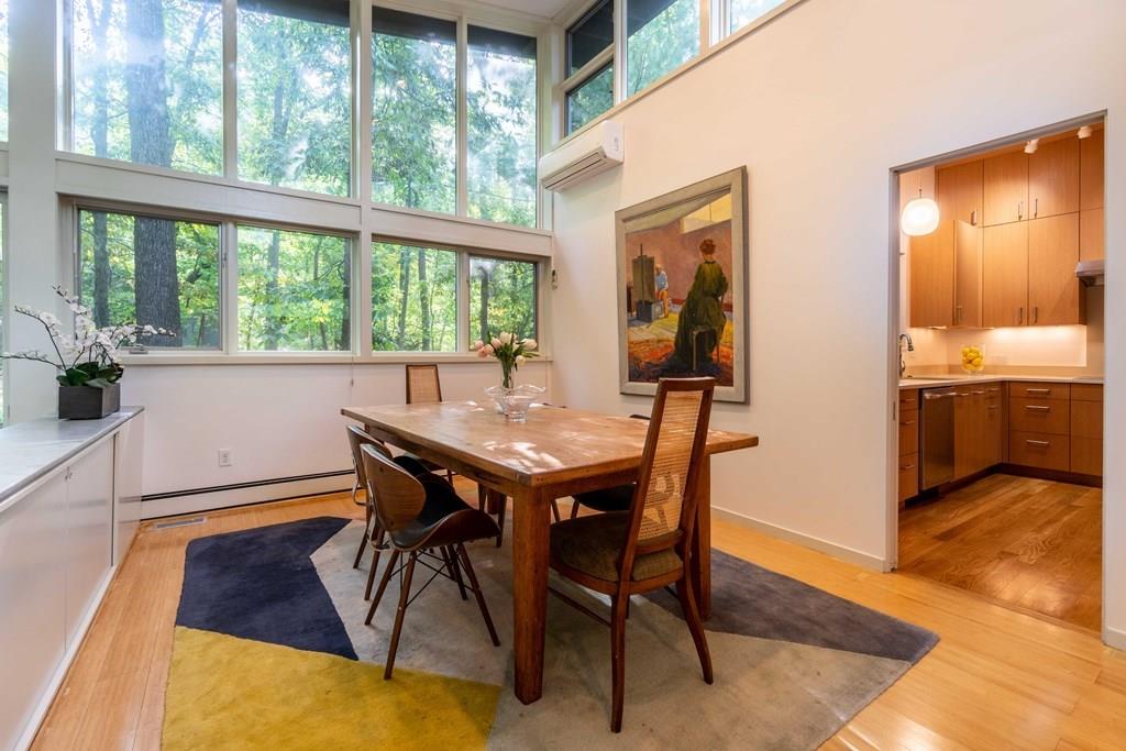 28 Peacock Farm Road Lexington, MA 02421 - Photo 12 of 29 a view of a dining room with furniture and wooden floor