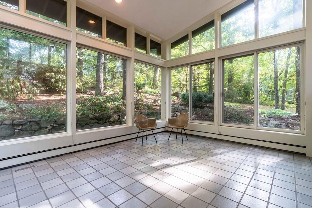 28 Peacock Farm Road Lexington, MA 02421 - Photo 18 of 29 a view of an empty room with a large window