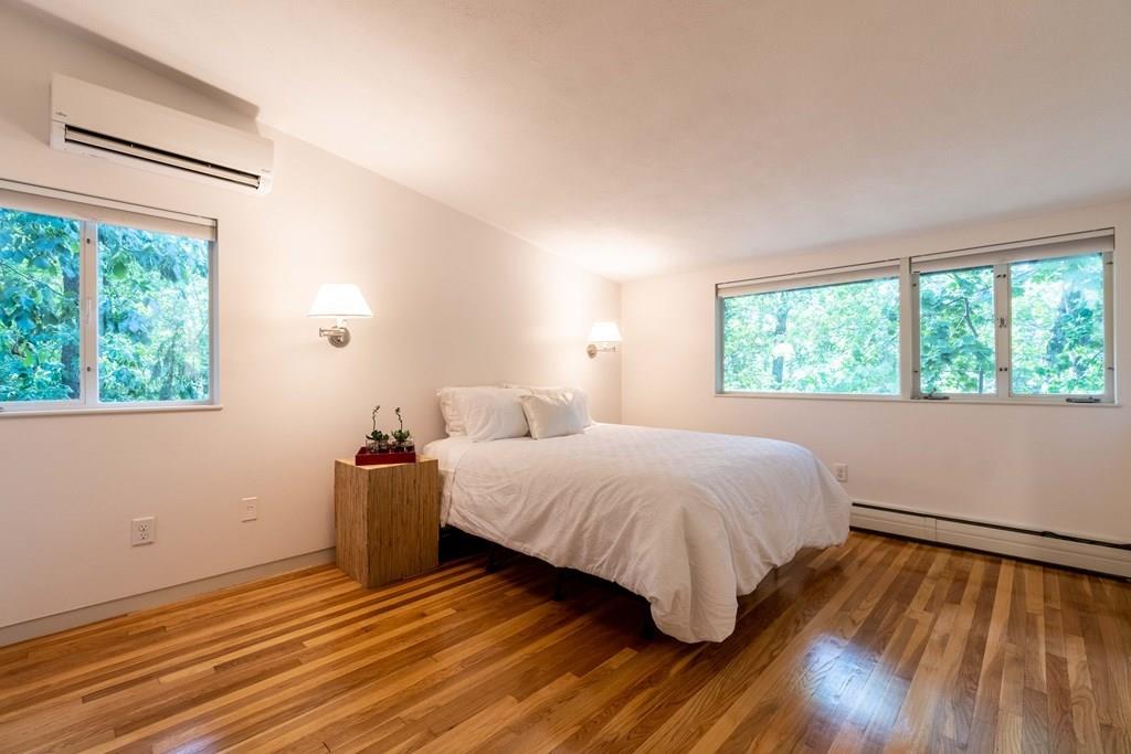 28 Peacock Farm Road Lexington, MA 02421 - Photo 20 of 29 a bed room with a bed and a window