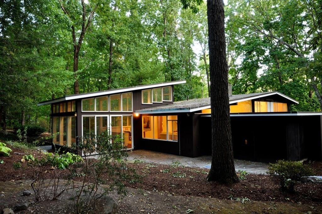 28 Peacock Farm Road Lexington, MA 02421 - Photo 2 of 29 a front view of house with yard and trees in the background