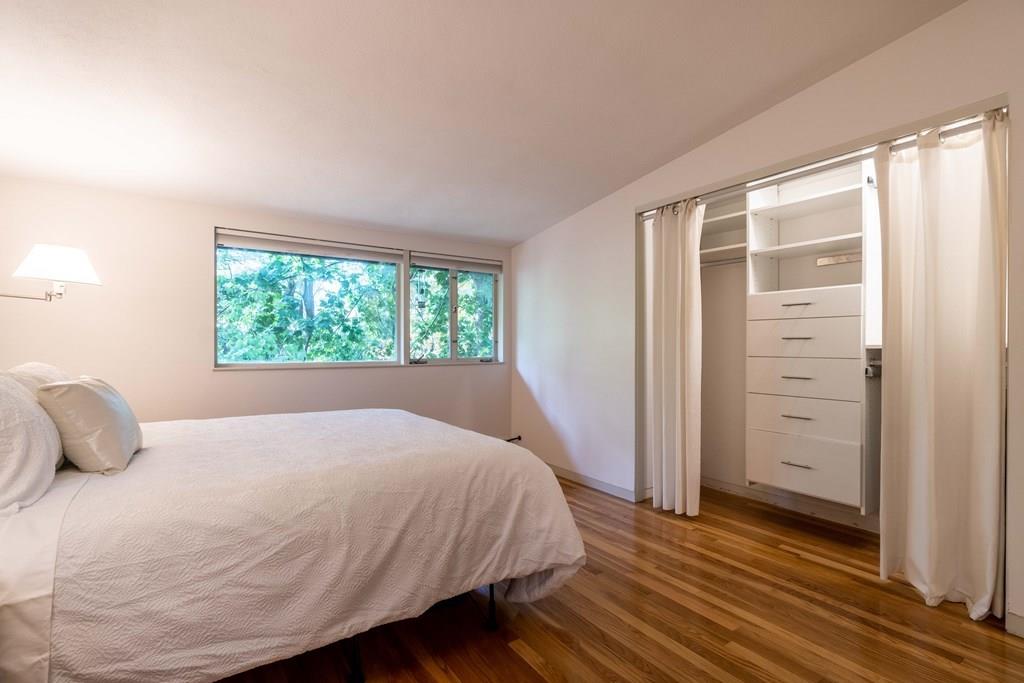 28 Peacock Farm Road Lexington, MA 02421 - Photo 21 of 29 a bedroom with a bed and a window