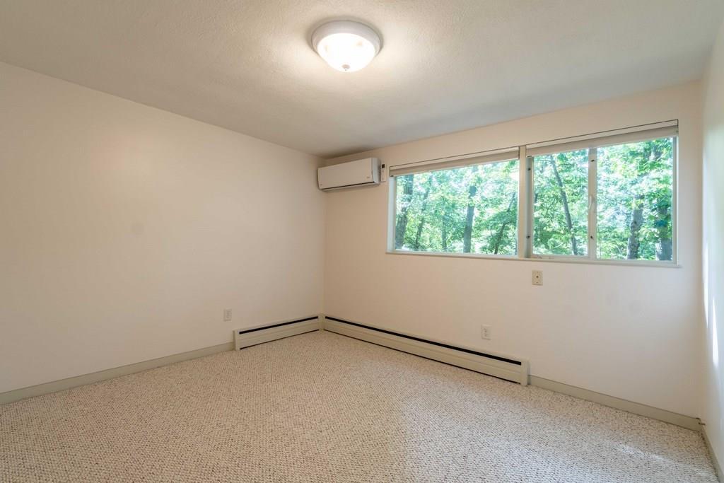 28 Peacock Farm Road Lexington, MA 02421 - Photo 24 of 29 an empty room with a window