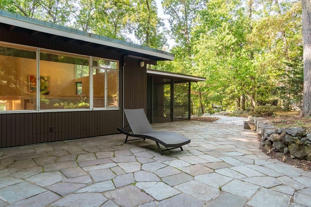 28 Peacock Farm Road Lexington, MA 02421 - Photo 28 of 29 a view of a two chair in the patio