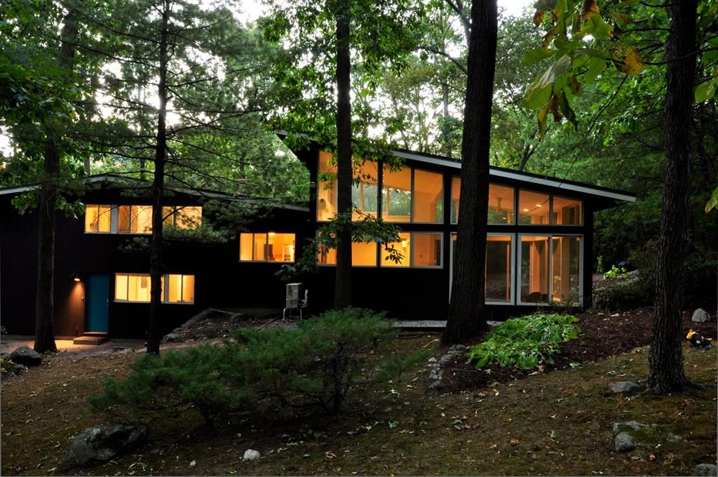 28 Peacock Farm Road Lexington, MA 02421 - Photo 3 of 29 a front view of a house with a yard