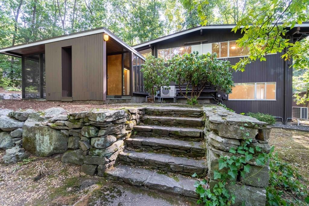 28 Peacock Farm Road Lexington, MA 02421 - Photo 4 of 29 a view of a house with backyard and sitting area