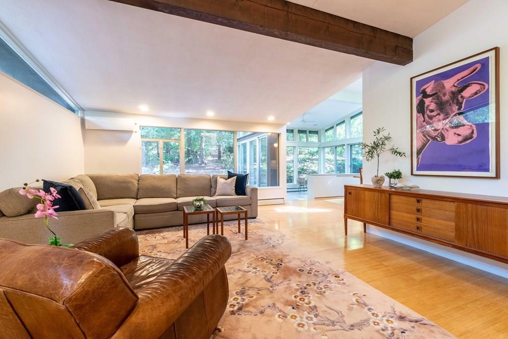 28 Peacock Farm Road Lexington, MA 02421 - Photo 7 of 29 a living room with furniture and a rug