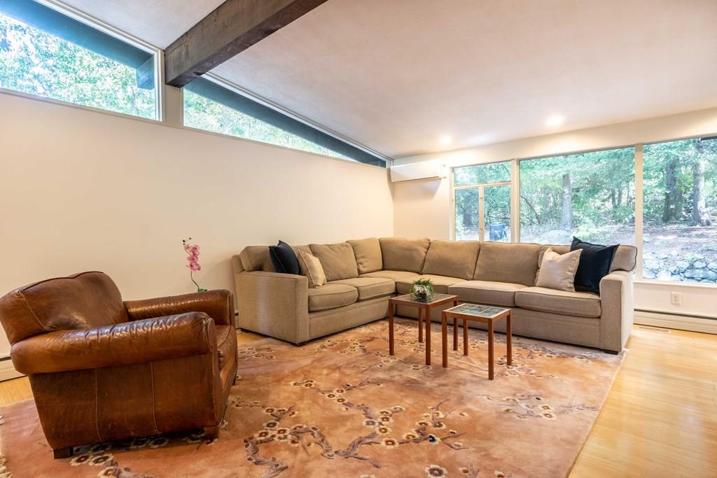 28 Peacock Farm Road Lexington, MA 02421 - Photo 8 of 29 a living room with furniture and a window