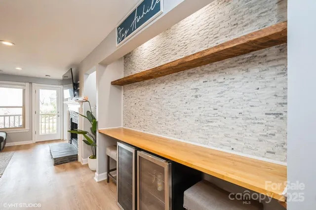 a hallway with seating area