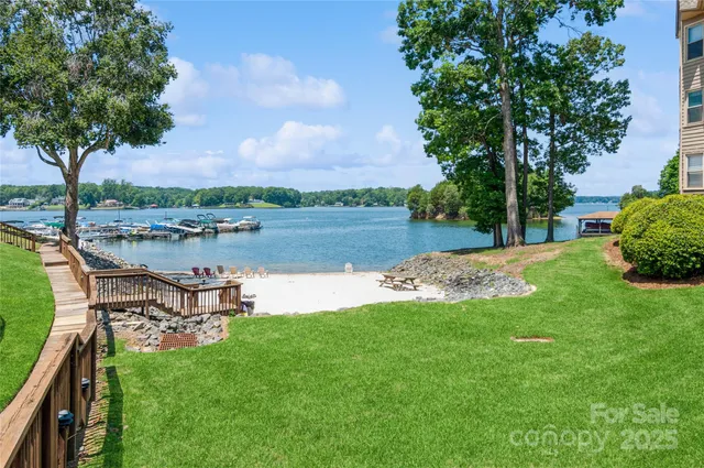 a view of a lake with a table and a bench