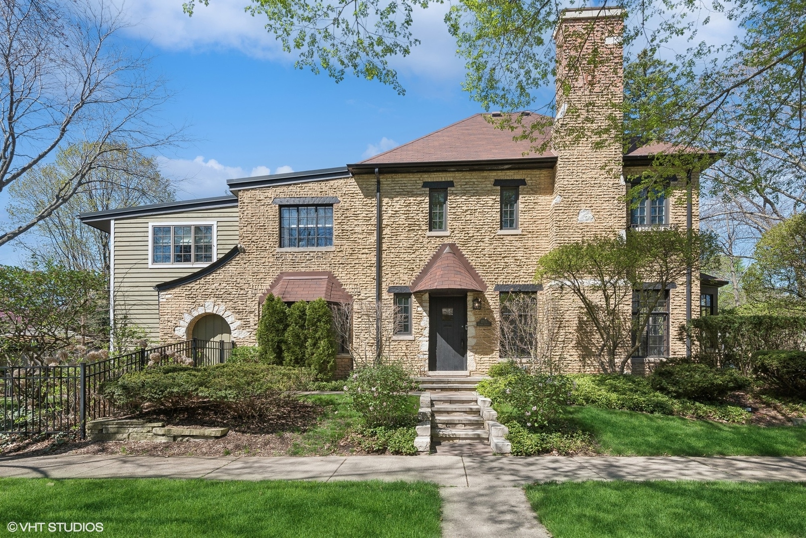 1701 Forest Avenue Wilmette, IL 60091 - Photo 1 of 35 a front view of a house with a yard