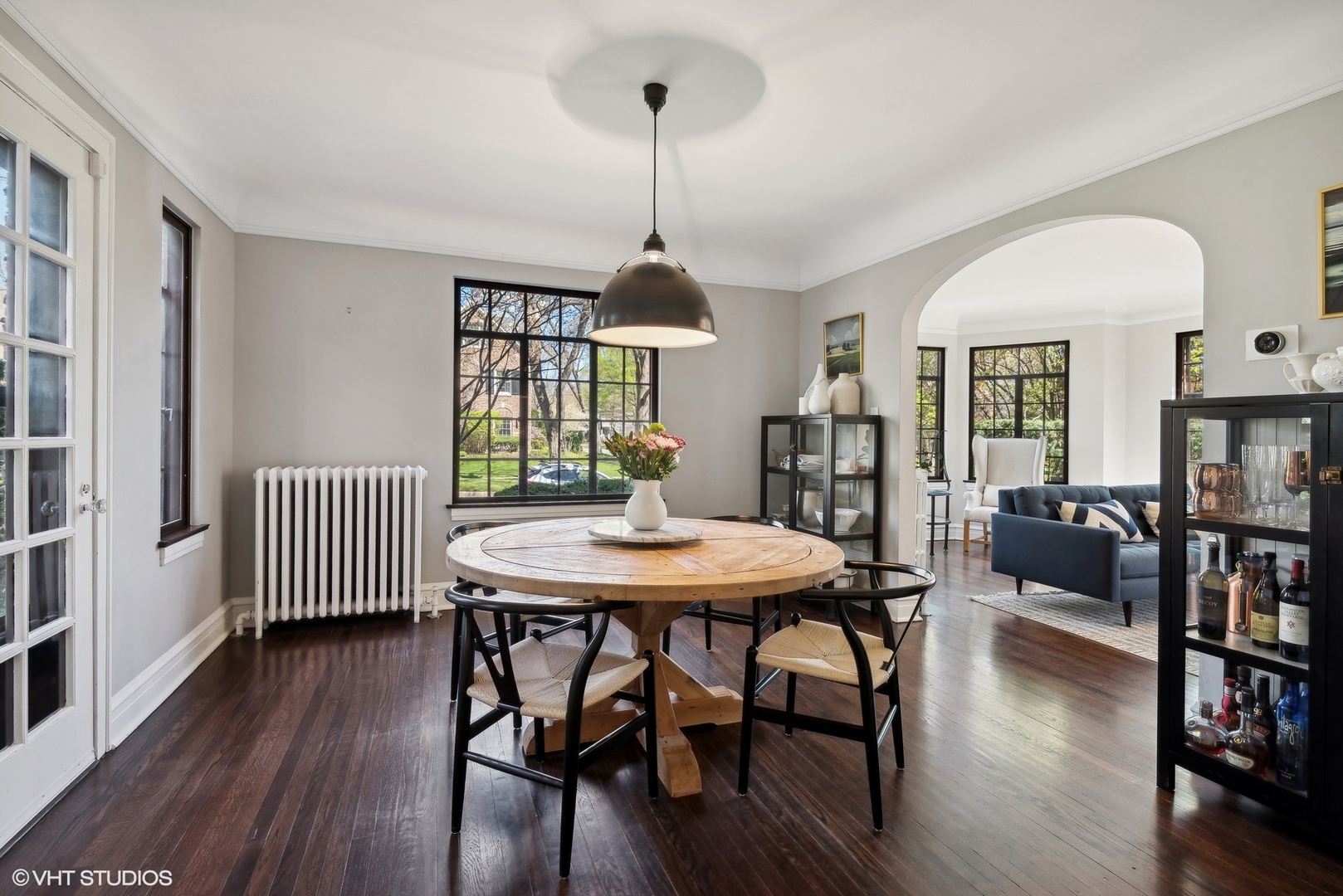 1701 Forest Avenue Wilmette, IL 60091 - Photo 11 of 35 a dining room with furniture a chandelier and wooden floor
