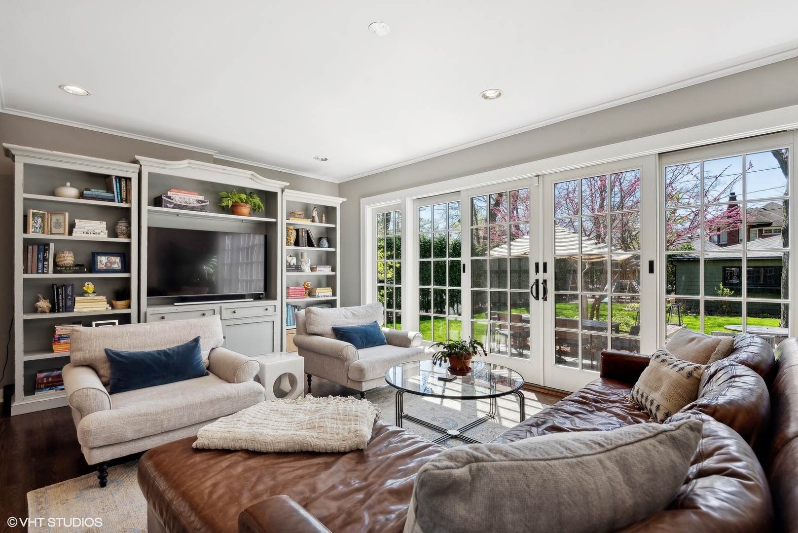 1701 Forest Avenue Wilmette, IL 60091 - Photo 13 of 35 a living room with furniture and a flat screen tv