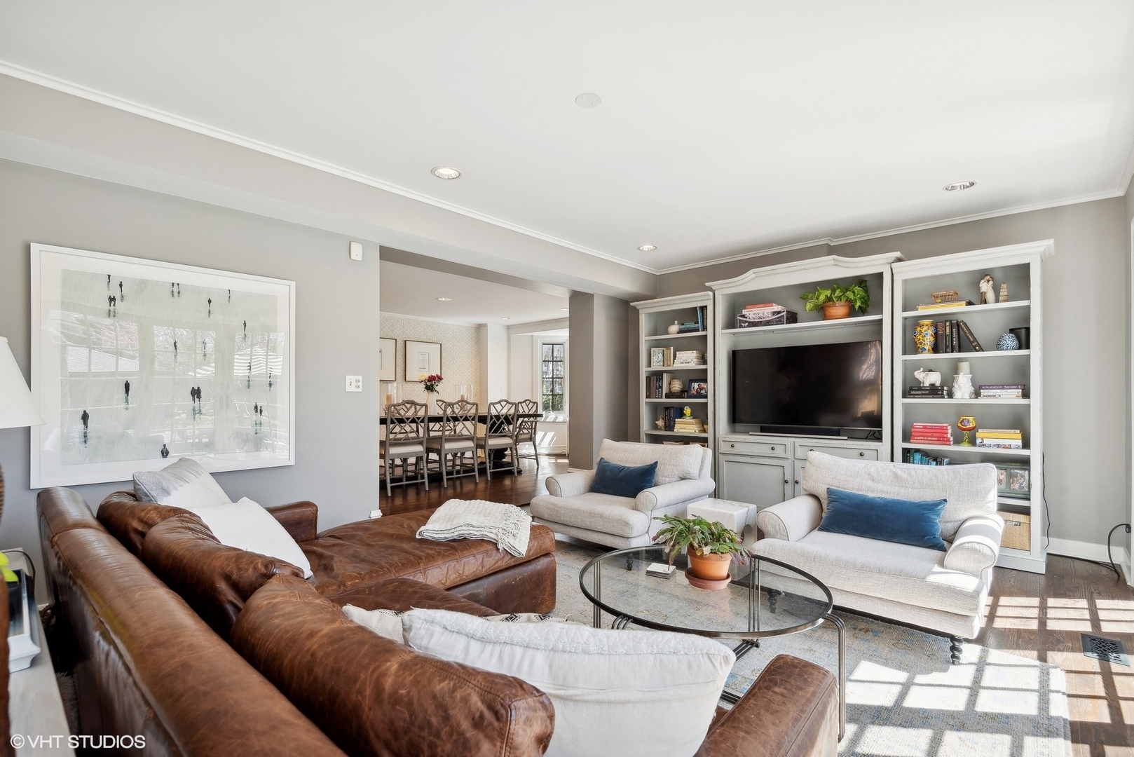 1701 Forest Avenue Wilmette, IL 60091 - Photo 14 of 35 a living room with furniture and a flat screen tv