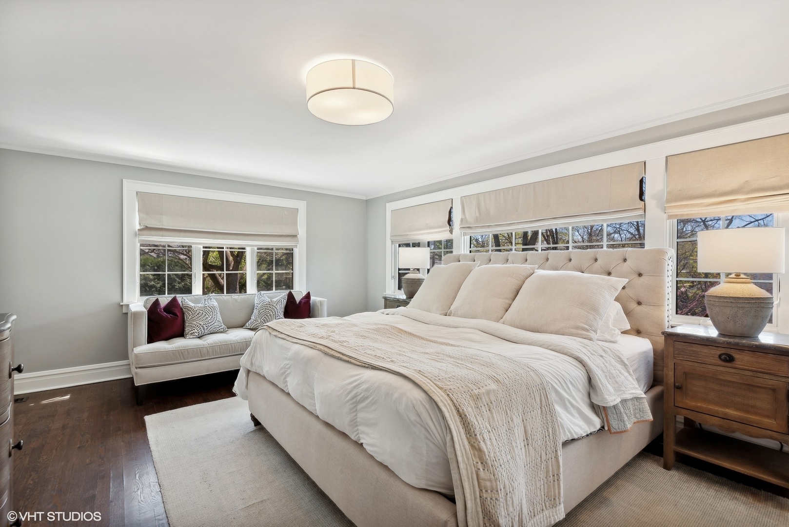 1701 Forest Avenue Wilmette, IL 60091 - Photo 17 of 35 a large bedroom with a bed and wooden floor