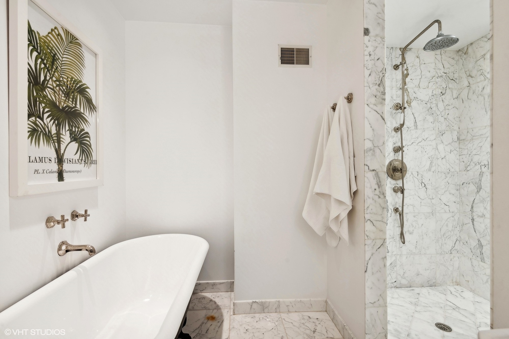 1701 Forest Avenue Wilmette, IL 60091 - Photo 21 of 35 a bathroom with a shower curtain and a sink