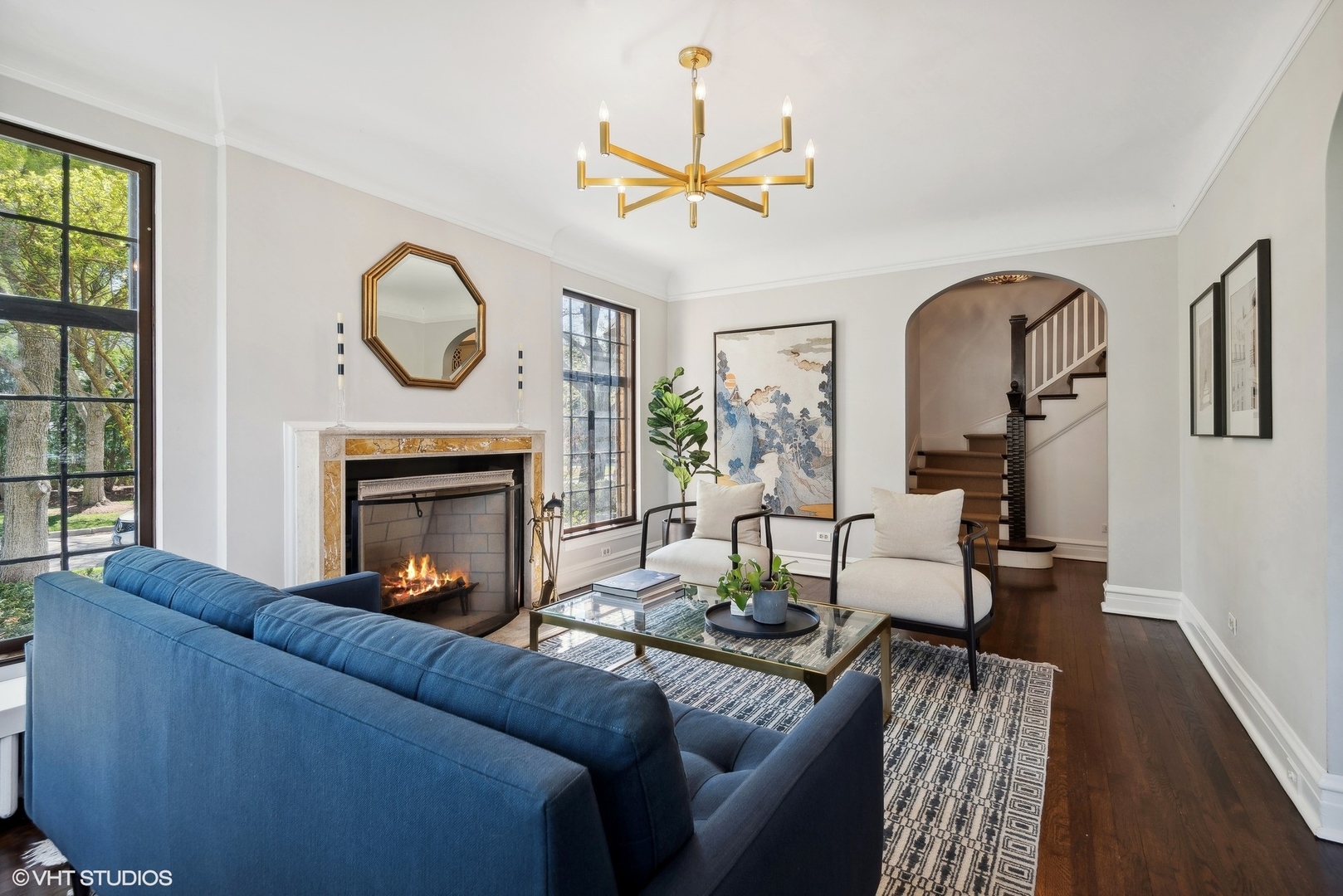 1701 Forest Avenue Wilmette, IL 60091 - Photo 6 of 35 a living room with furniture a fireplace and wooden floor