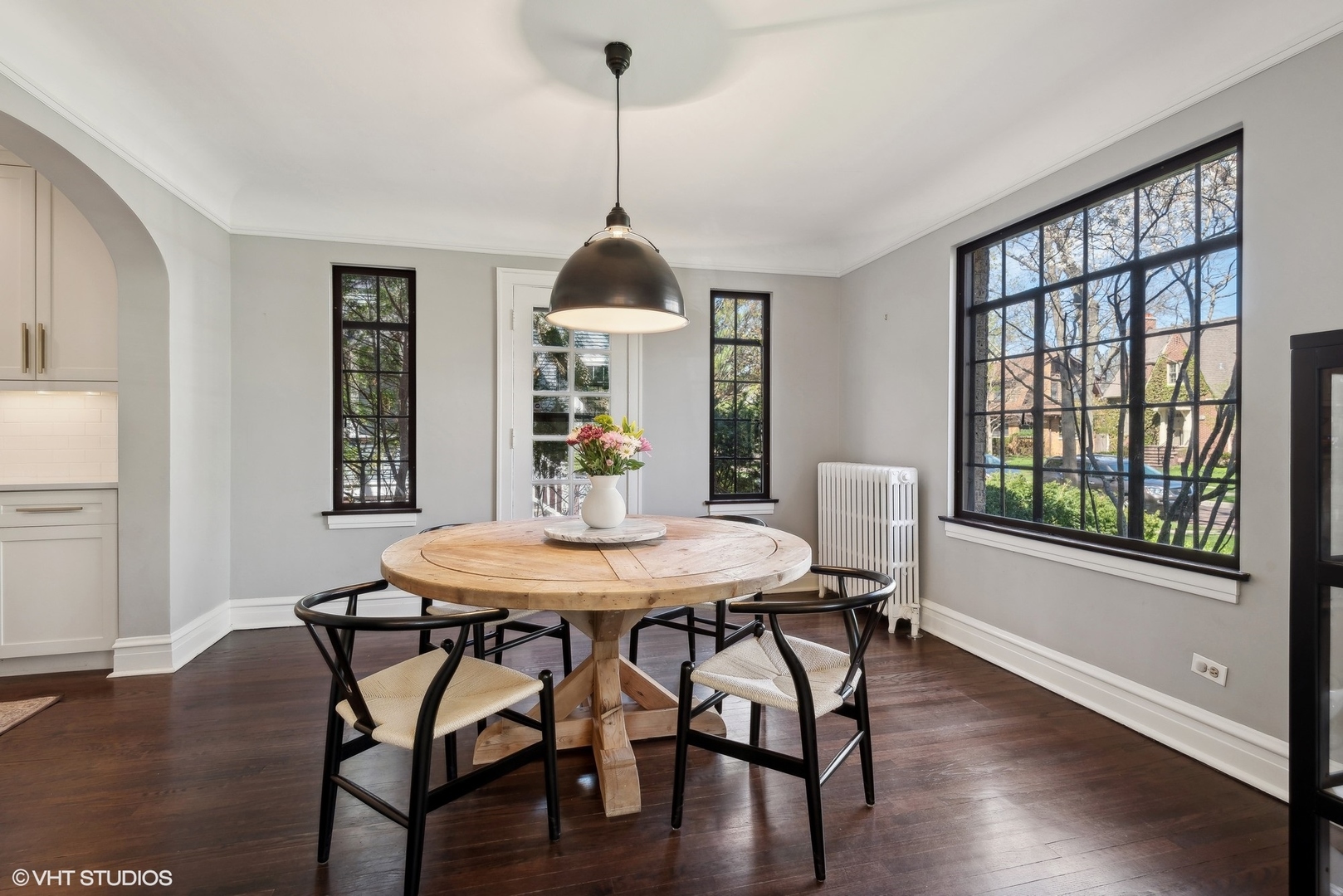 1701 Forest Avenue Wilmette, IL 60091 - Photo 10 of 35 a view of a dining room with furniture window and wooden floor