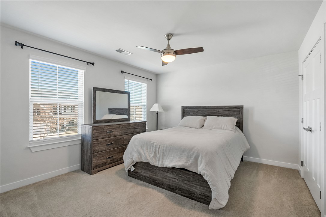 115 Bronson Ridge Anderson, SC 29621 - Photo 30 of 40 Plentiful natural light fills this bedroom complete with neutral carpeting.