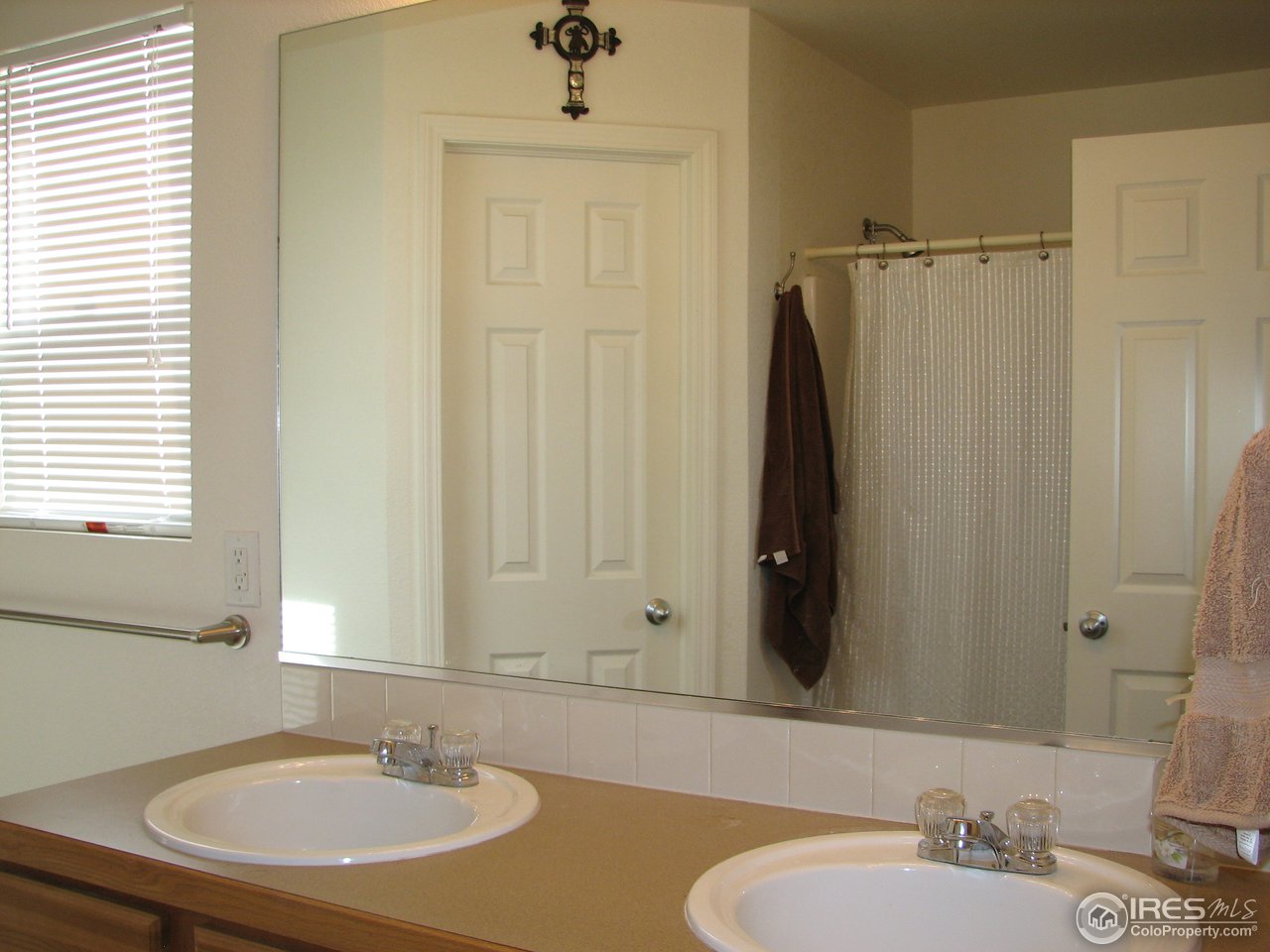 6887 McClellan Road Wellington, CO 80549 - Photo 14 of 25 3/4 master bathroom with walk-in closet