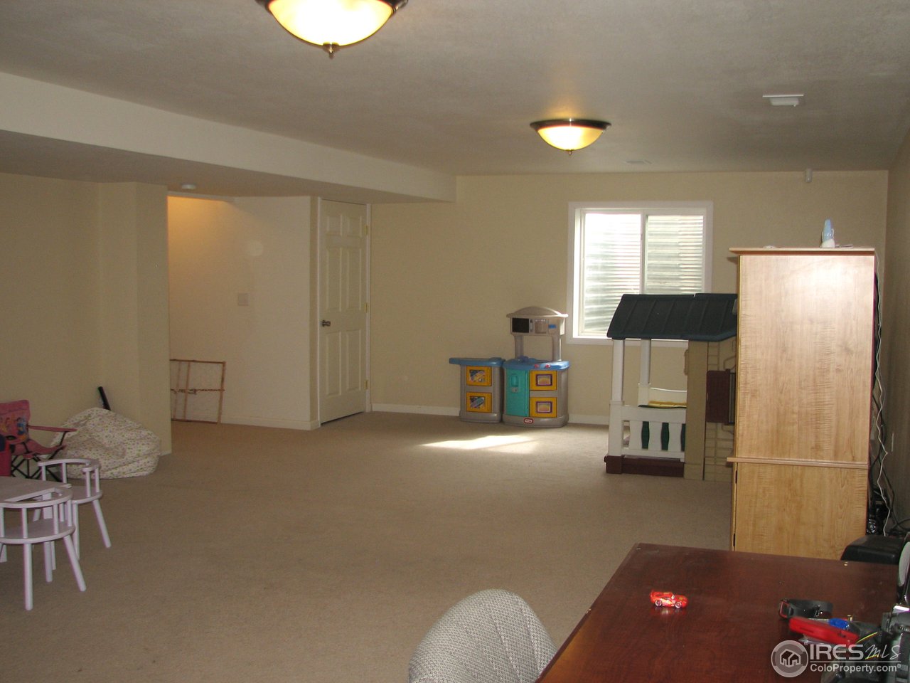 6887 McClellan Road Wellington, CO 80549 - Photo 18 of 25 Basement family room
