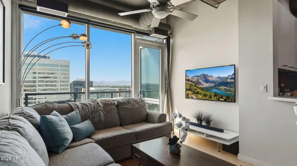 a view of a balcony with an ocean view