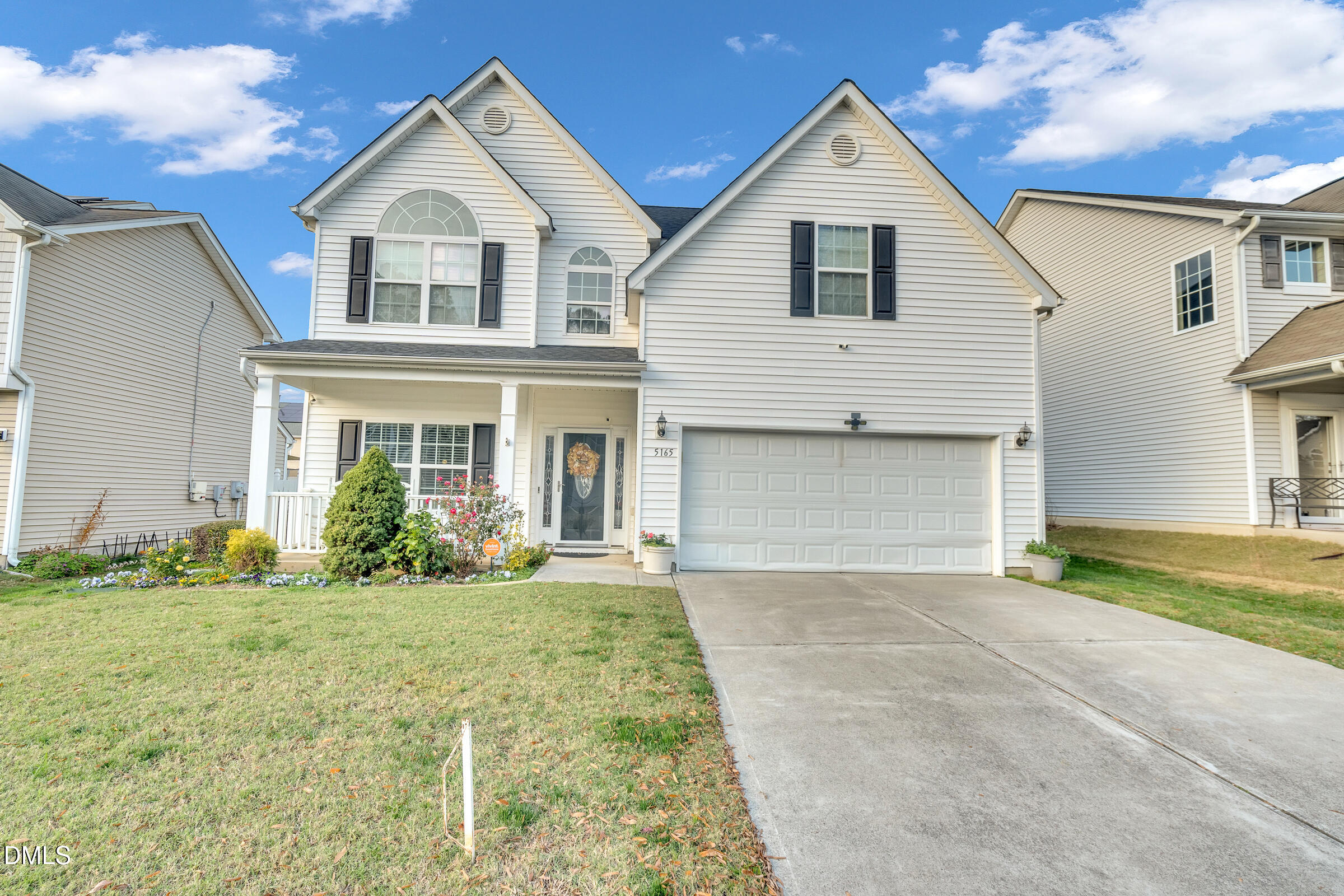 5165 Busted Rock Trail Raleigh, NC 27610 - Photo 1 of 18 front view of house with a yard