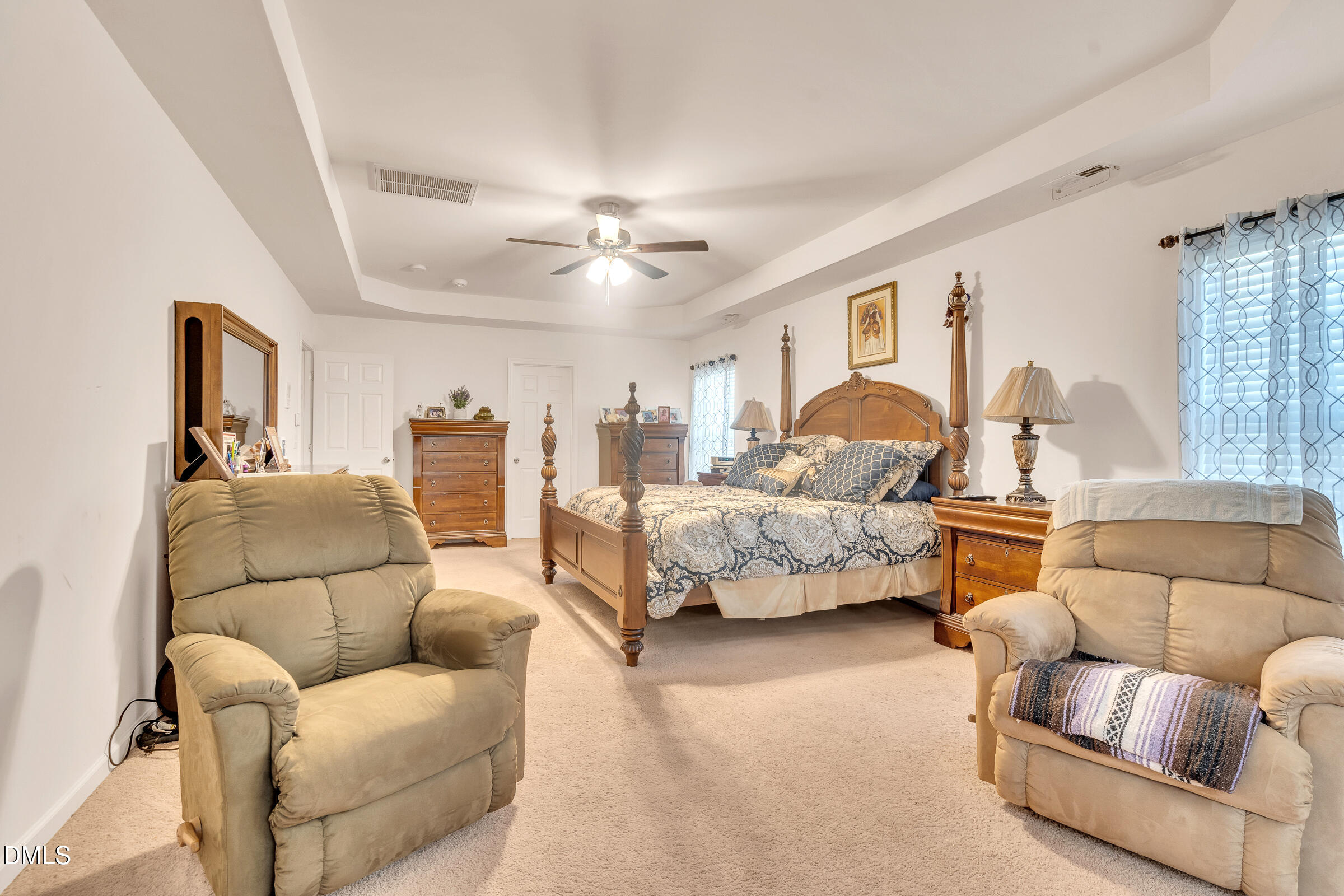 5165 Busted Rock Trail Raleigh, NC 27610 - Photo 13 of 18 a bedroom with furniture and a large window