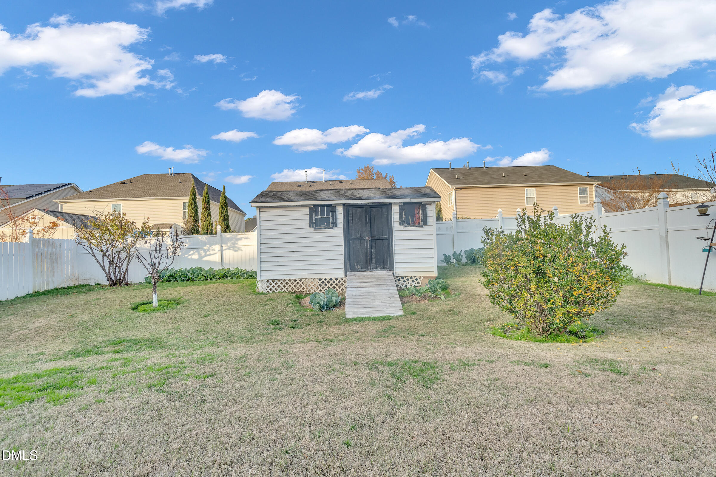 5165 Busted Rock Trail Raleigh, NC 27610 - Photo 4 of 18 a view of a back yard of the house