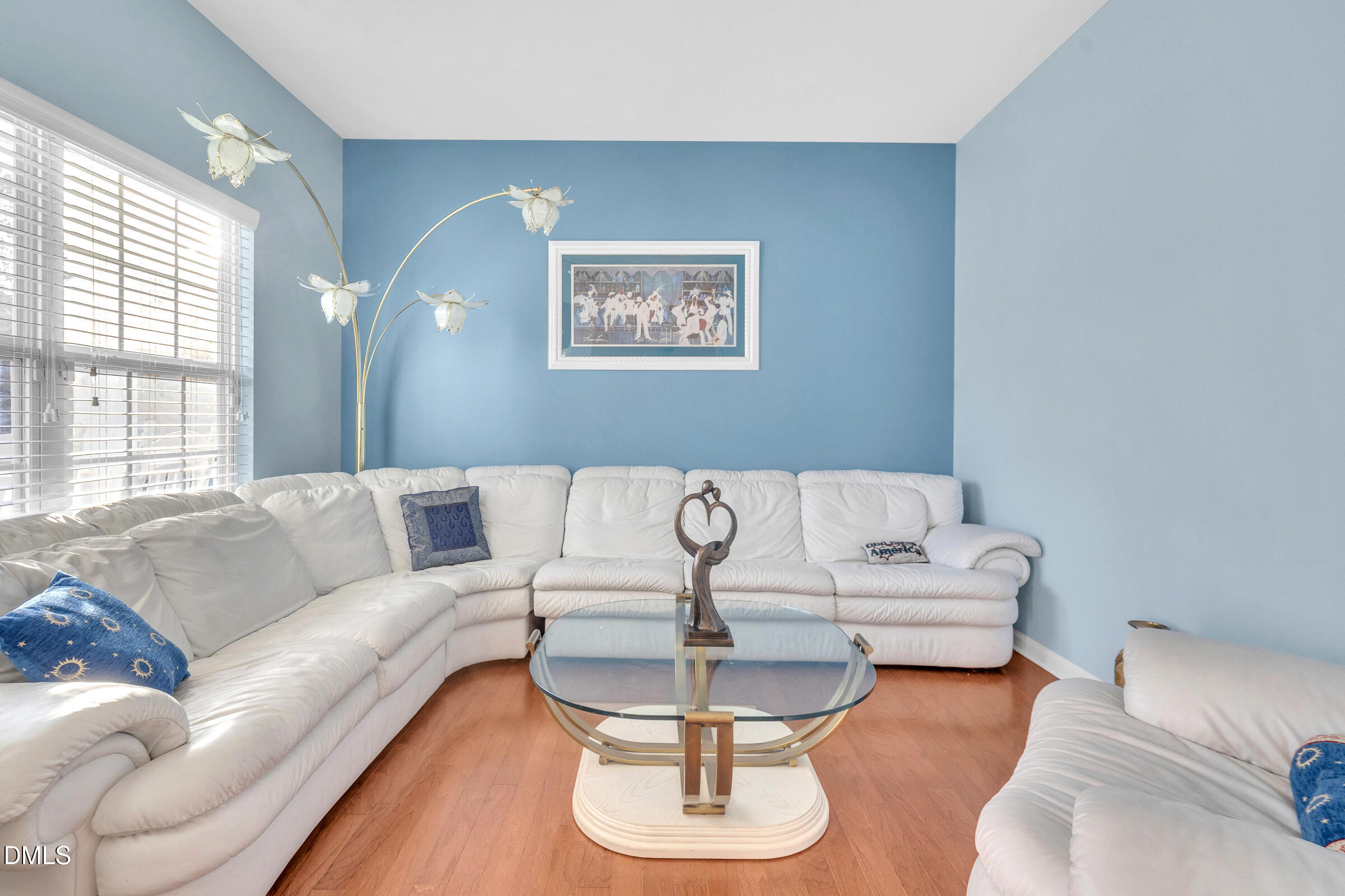 5165 Busted Rock Trail Raleigh, NC 27610 - Photo 5 of 18 a living room with furniture and a large window