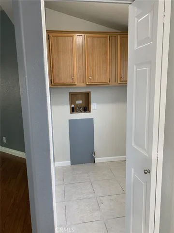 a view of kitchen with wooden floor
