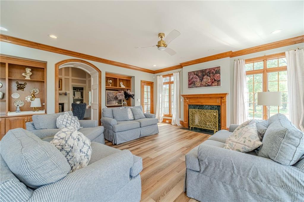 1271 Carl Davis Road Northwest Monroe, GA 30656 - Photo 22 of 80 a living room with furniture large window and a fireplace
