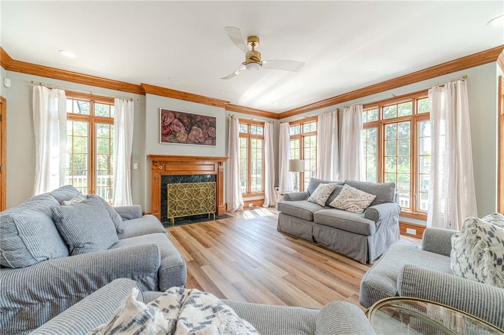 1271 Carl Davis Road Northwest Monroe, GA 30656 - Photo 23 of 80 a living room with furniture large window and a fireplace