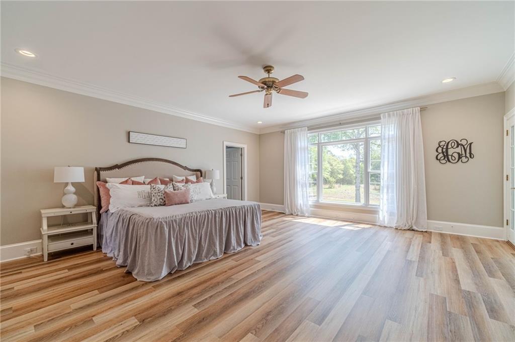 1271 Carl Davis Road Northwest Monroe, GA 30656 - Photo 26 of 80 a bedroom with a bed and a window