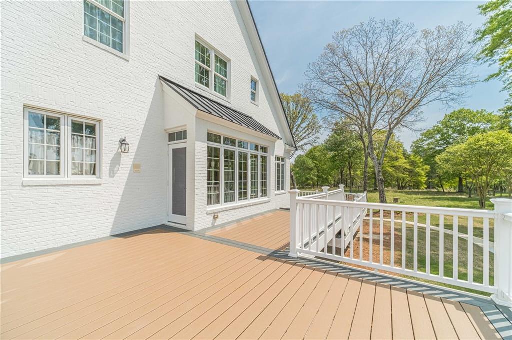1271 Carl Davis Road Northwest Monroe, GA 30656 - Photo 66 of 80 a view of balcony with wooden floor and fence