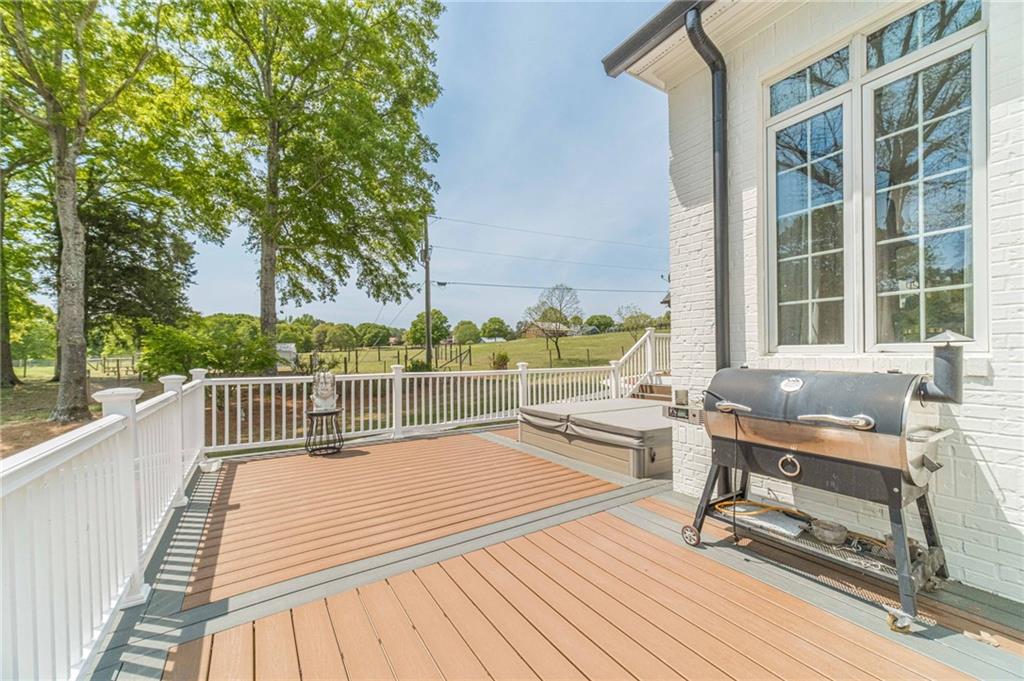 1271 Carl Davis Road Northwest Monroe, GA 30656 - Photo 68 of 80 a view of balcony with wooden floor and seating space