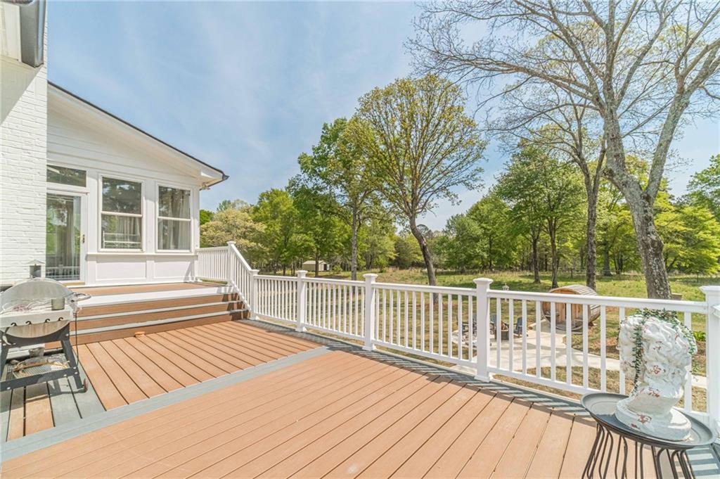 1271 Carl Davis Road Northwest Monroe, GA 30656 - Photo 69 of 80 a view of balcony with wooden floor and fence
