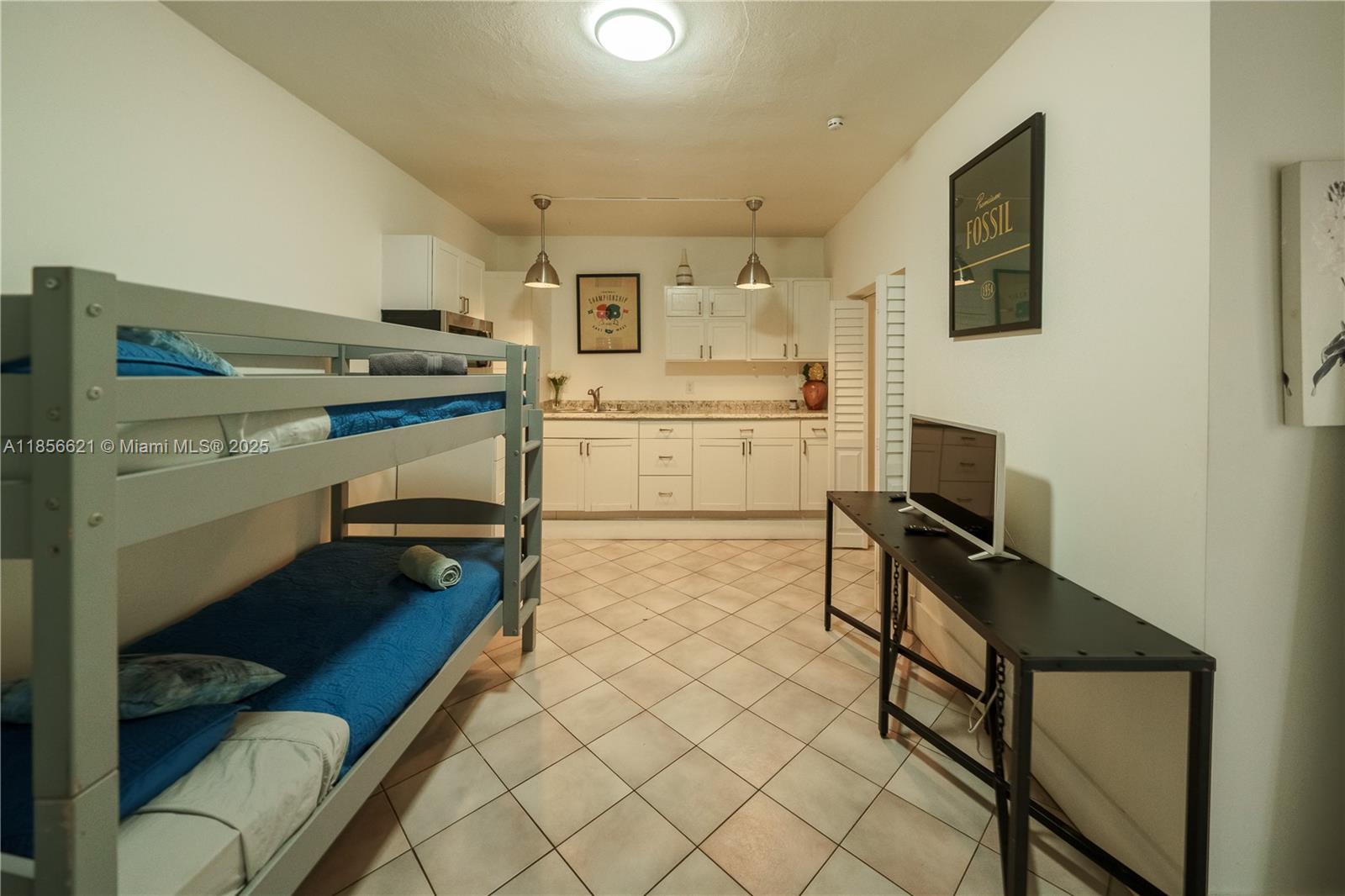 701 Hollywood Boulevard, Unit 701 Hollywood, FL 33019 - Photo 19 of 27 a room with storage and utility