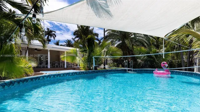 a view of a park with swings and slides