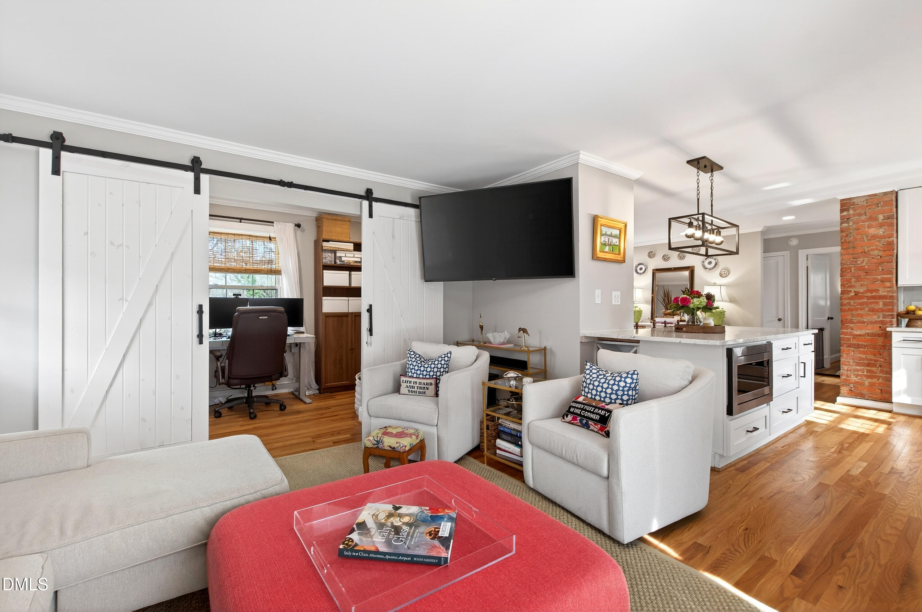 1802 Rankin Street Raleigh, NC 27604 - Photo 13 of 37 a living room with furniture and a flat screen tv