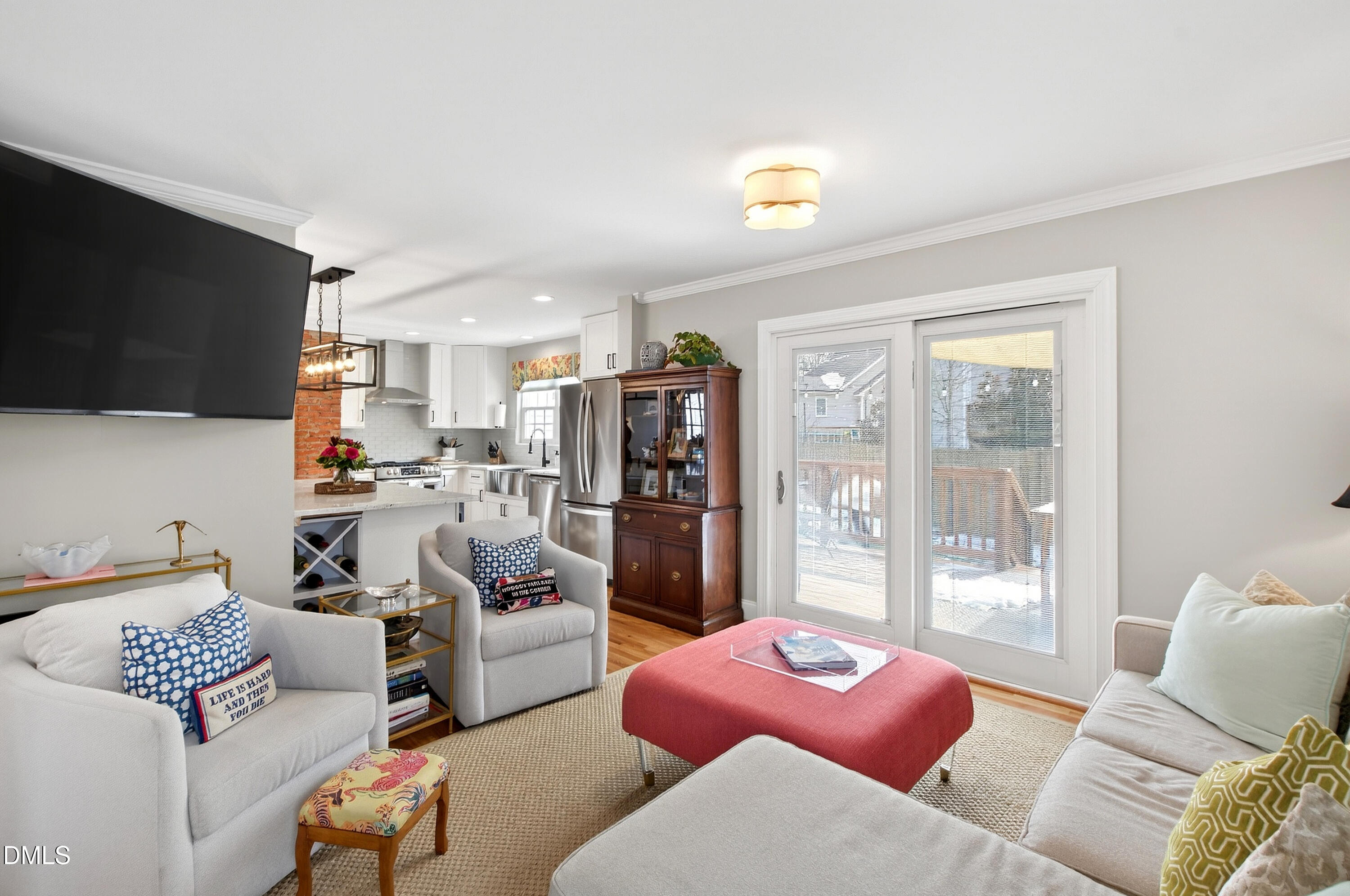 1802 Rankin Street Raleigh, NC 27604 - Photo 14 of 37 a living room with furniture and a flat screen tv