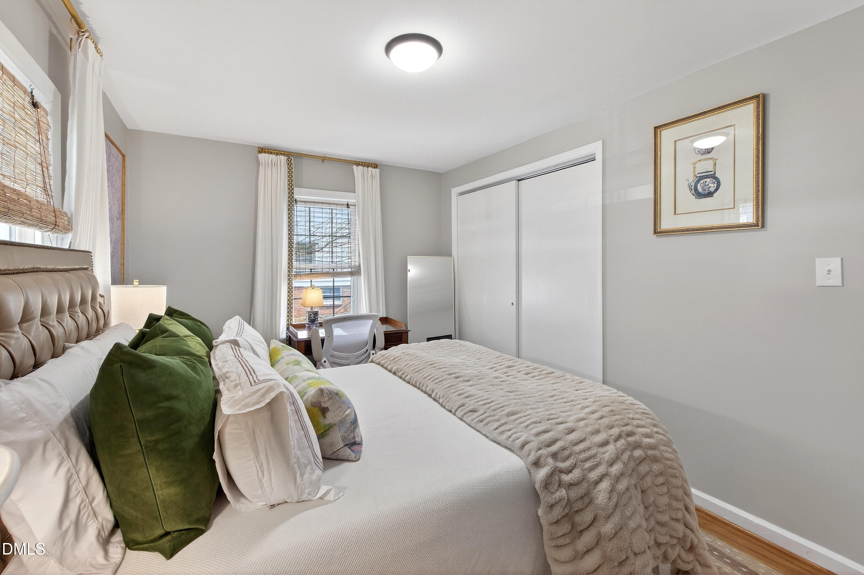 1802 Rankin Street Raleigh, NC 27604 - Photo 22 of 37 a bedroom with a bed and a window