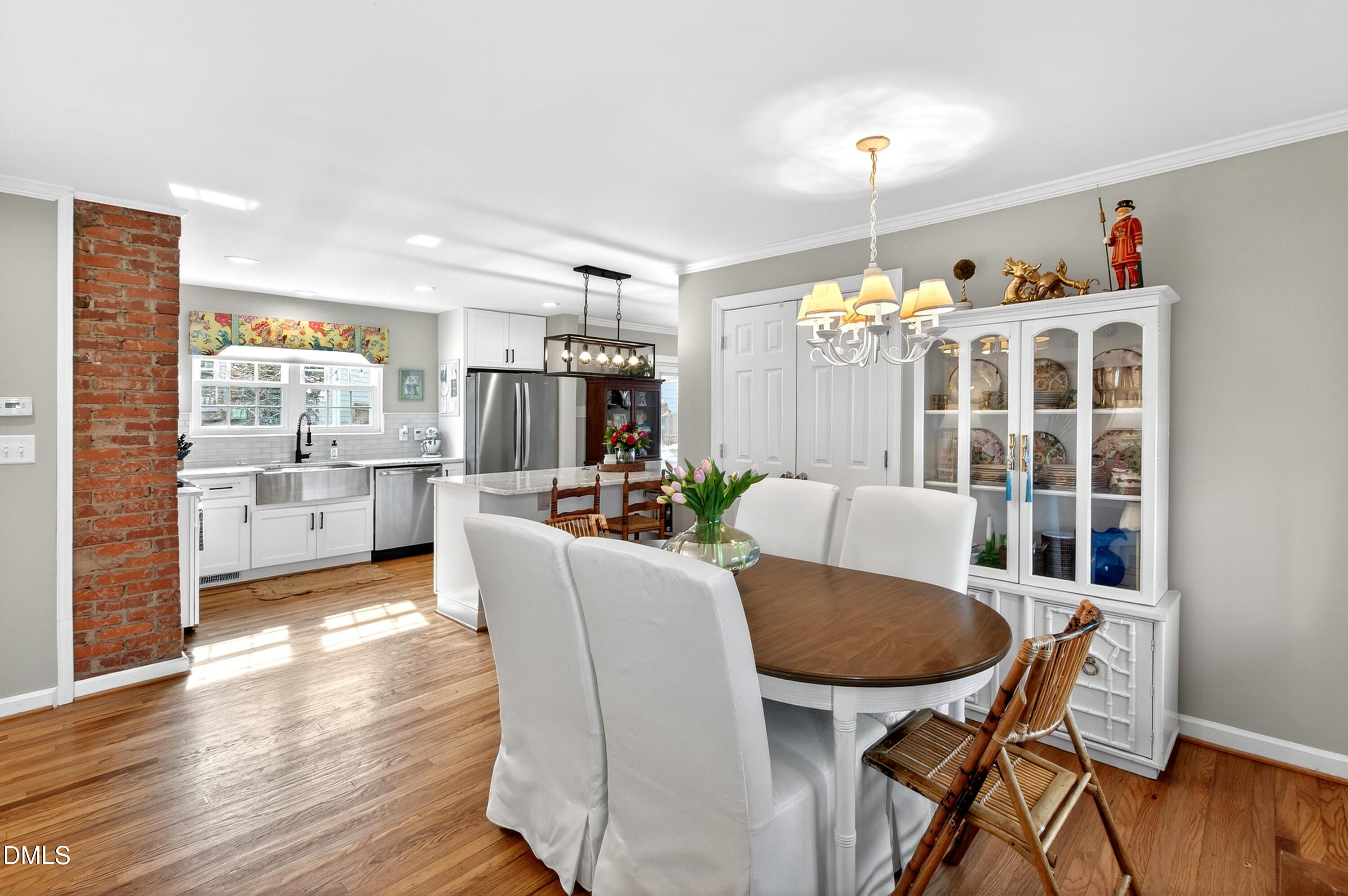 1802 Rankin Street Raleigh, NC 27604 - Photo 6 of 37 a view of a dining room with furniture window and wooden floor