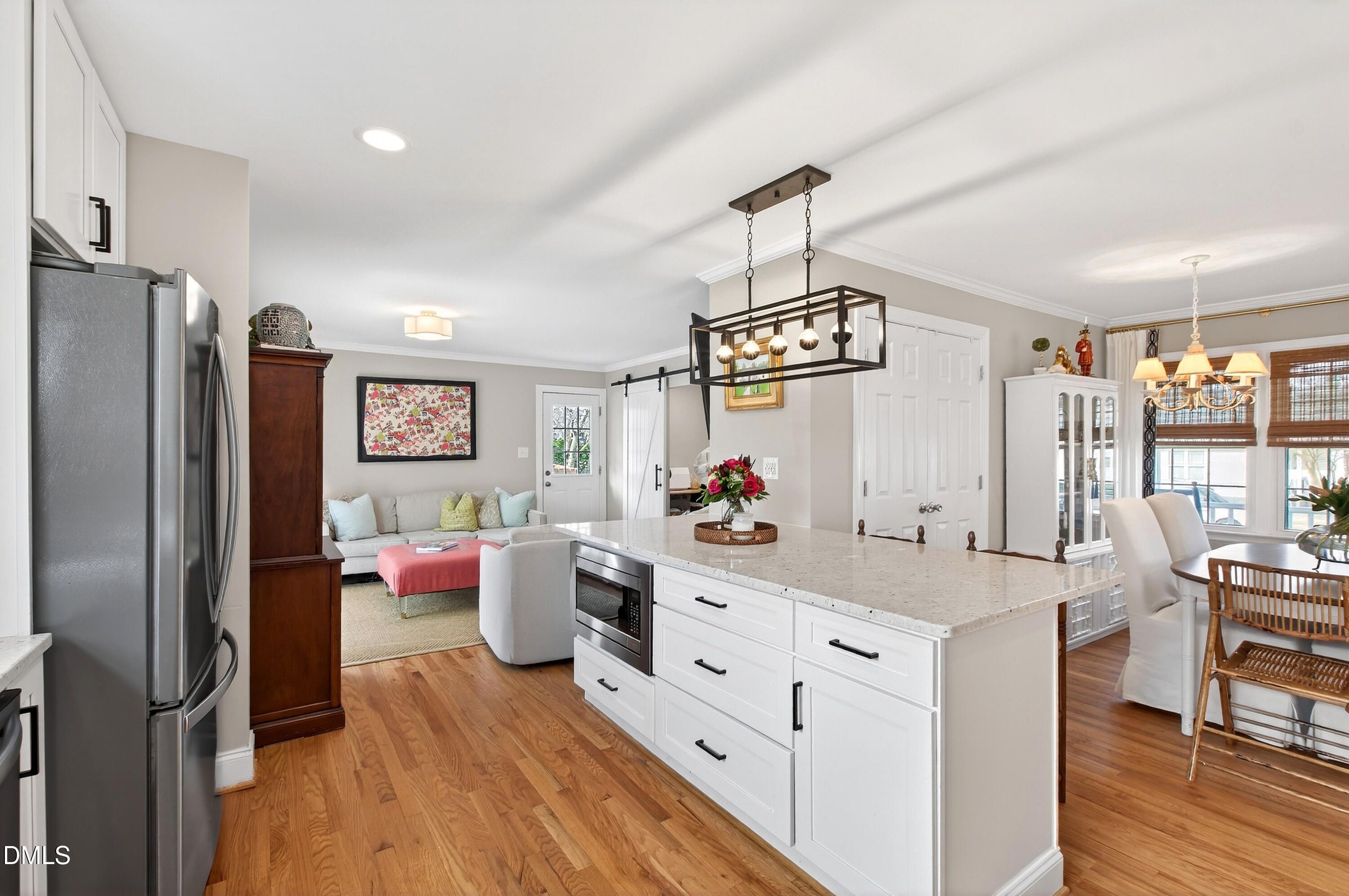 1802 Rankin Street Raleigh, NC 27604 - Photo 8 of 37 a kitchen that has a lot of cabinets a sink and appliances in it