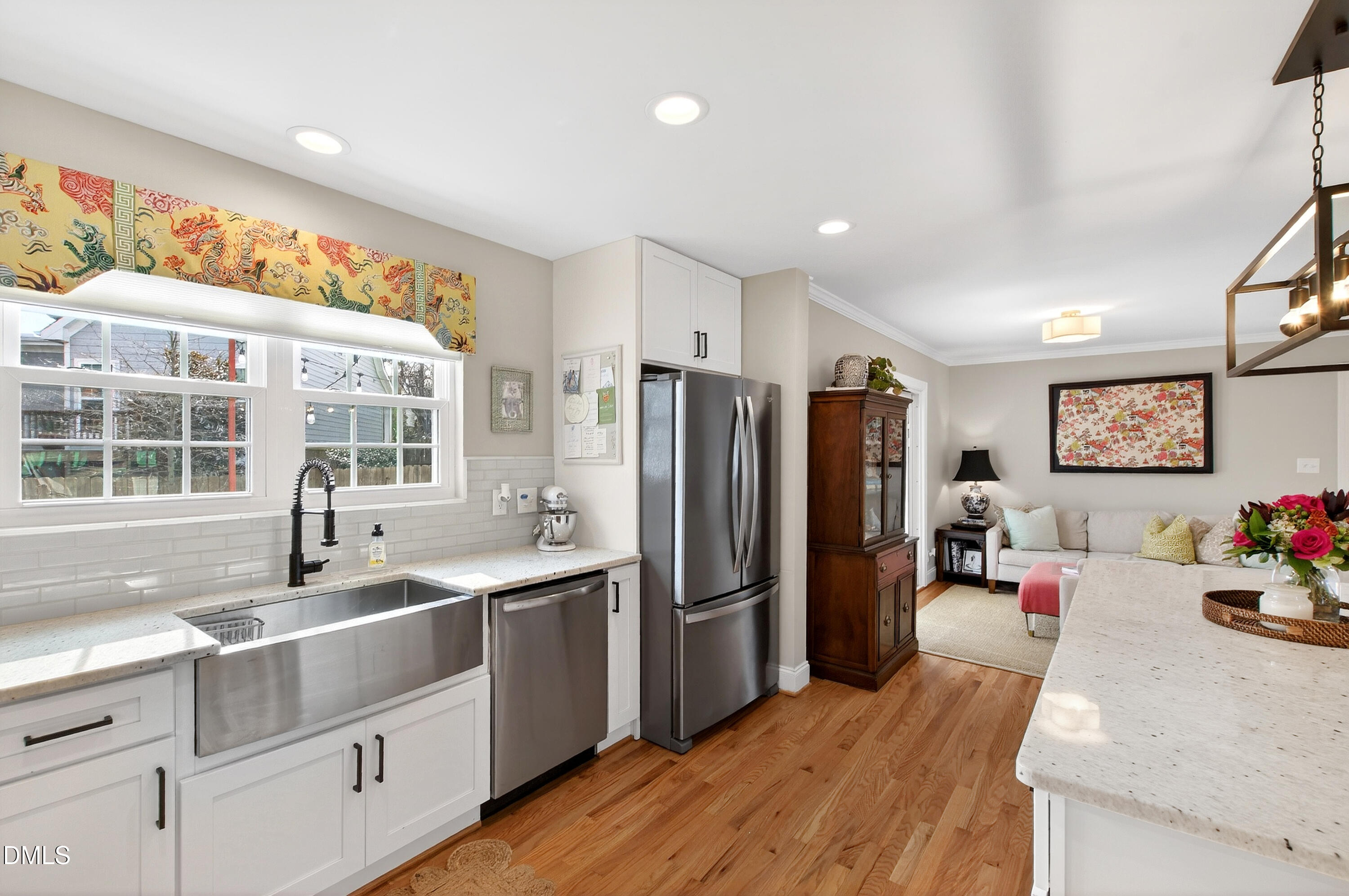 1802 Rankin Street Raleigh, NC 27604 - Photo 9 of 37 a kitchen with stainless steel appliances granite countertop a refrigerator and a sink