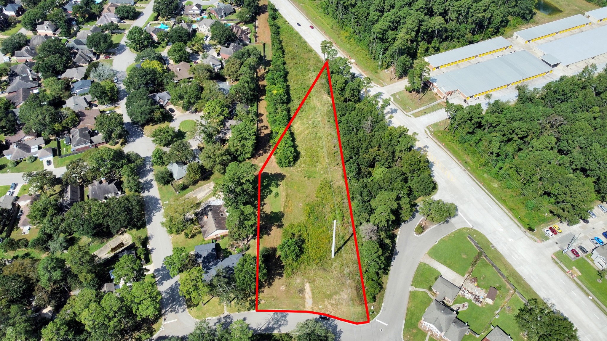 Tbd Tbd Rivershire Conroe, TX 77304 - Photo 2 of 9 a view of a flower in a garden