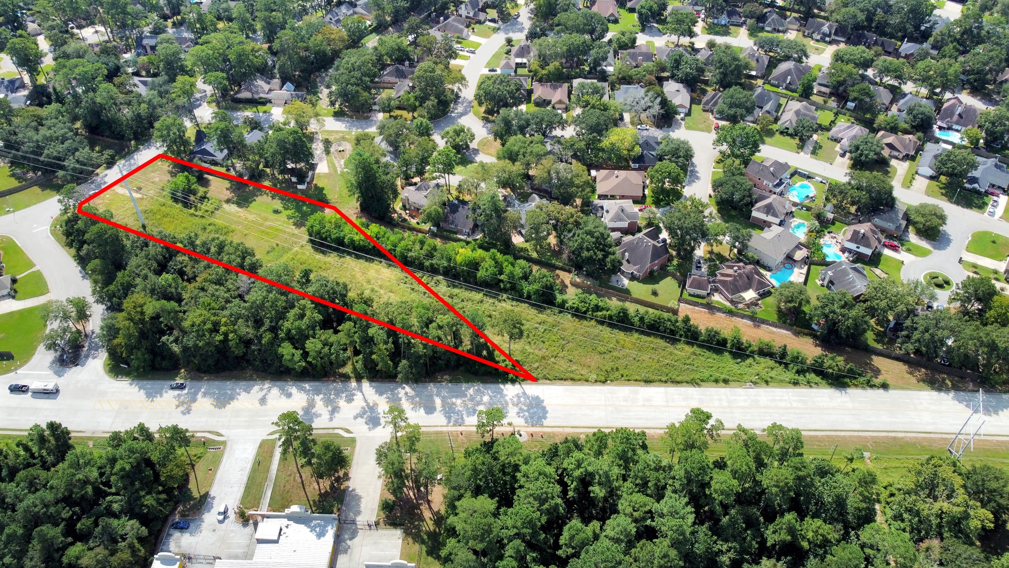 Tbd Tbd Rivershire Conroe, TX 77304 - Photo 4 of 9 an aerial view of a city