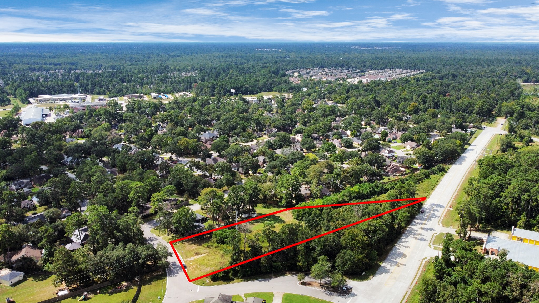 Tbd Tbd Rivershire Conroe, TX 77304 - Photo 8 of 9 a view of a city