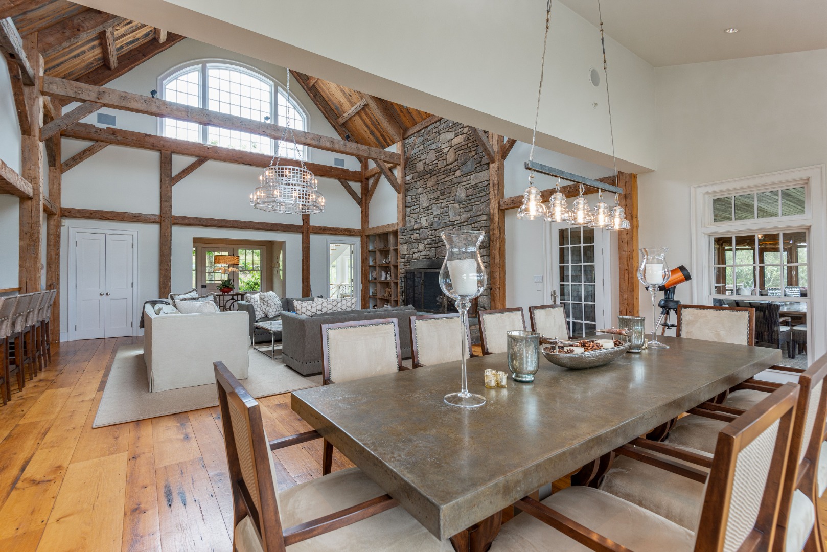 183 Polpis Road Nantucket, MA 02554 - Photo 16 of 62 a view of a dining room with furniture and wooden floor