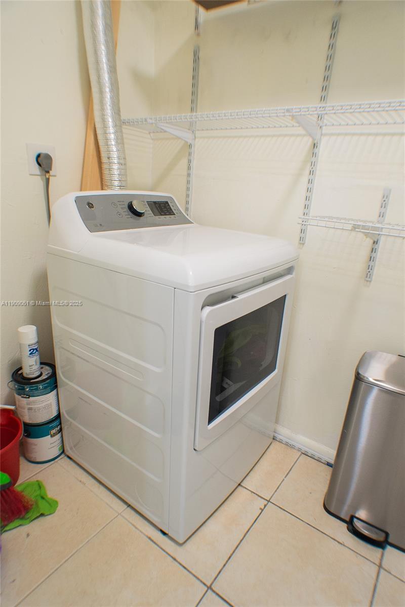 12800 Southwest 43rd Drive, Unit 210B Miami, FL 33175 - Photo 13 of 25 a utility room with dryer and washer