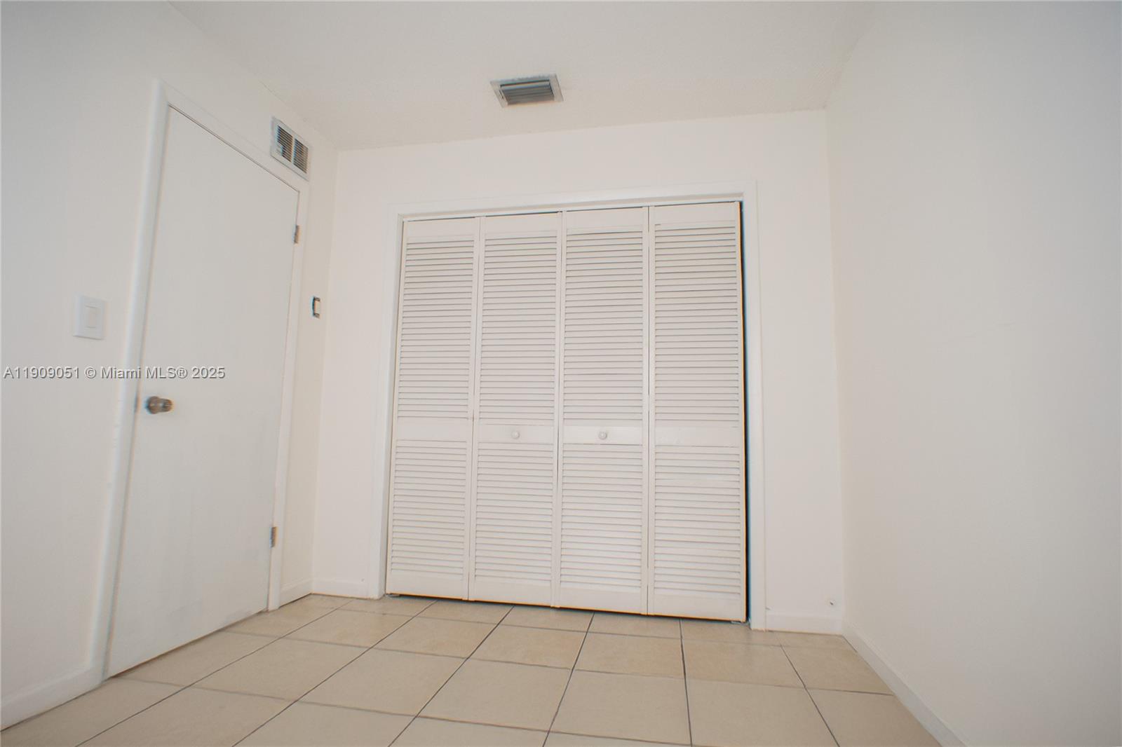 12800 Southwest 43rd Drive, Unit 210B Miami, FL 33175 - Photo 19 of 25 a view of an empty room